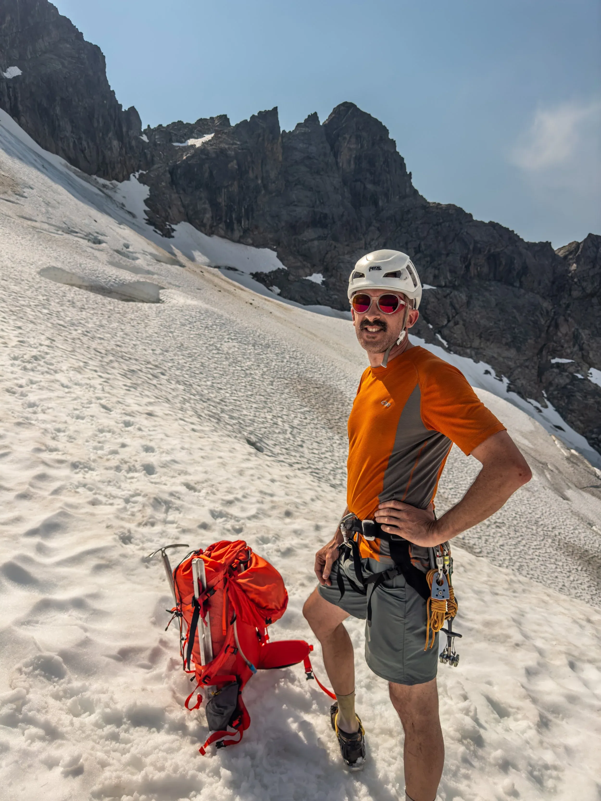 At the first technical crux: a traverse across a crevassed snow slope to a steep loose rock gully to gain the ridge. Nothing steep or difficult necessitating ropes, but from here on the mental game starts, where careful footwork and controlled movement is required to stay on your feet above consequential terrain.