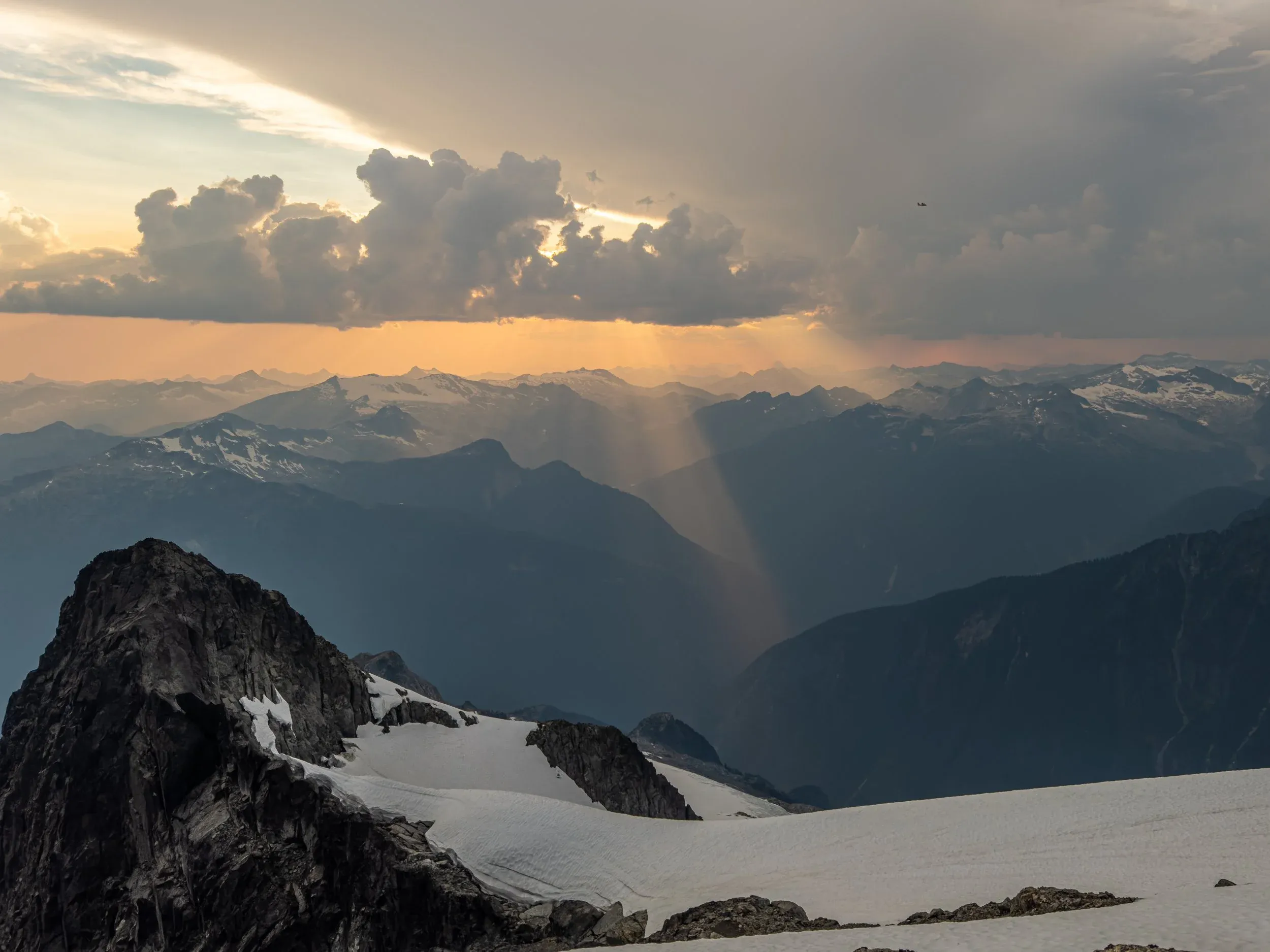 At this point, the weather played into the mental game, with distant pockets of thundershowers to both the East and West. The lighting was beautiful, but immediately became aware of our exposed position on the ridge if a storm rolled through.   We were about to receive another warning shortly…