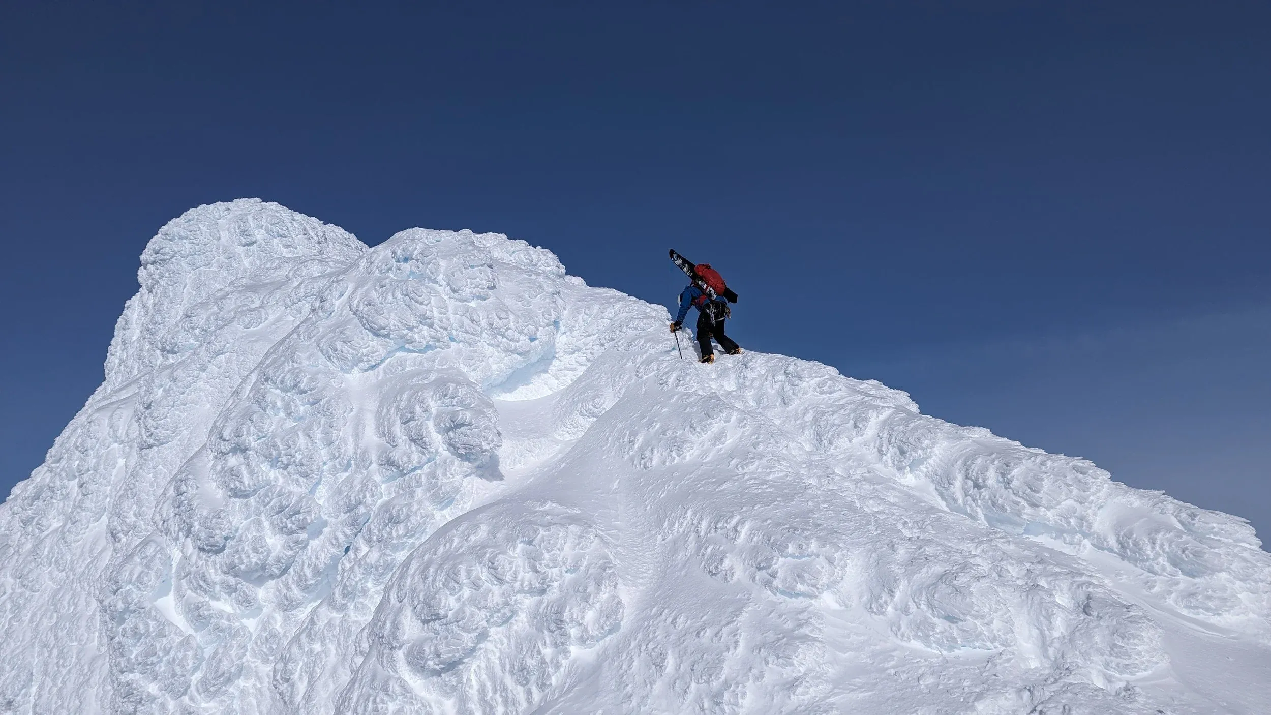 Spicy down climb on the wind hammered Matier summit to access the skiing on the northwest face